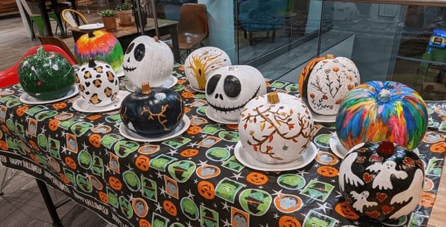 hand painted pumpkins in a range of halloween style designs like skulls, ghosts etc.